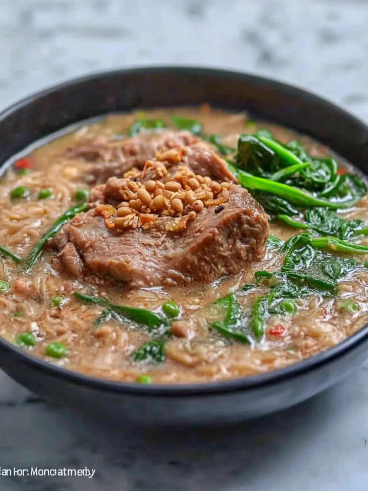 Pork Hock and Mung Beans with Vermicelli: Comfort in Every Bite 4 Pork Hock and Mung Beans with Vermicelli (Ginisang Monggo with Pata at Sotanghon)
