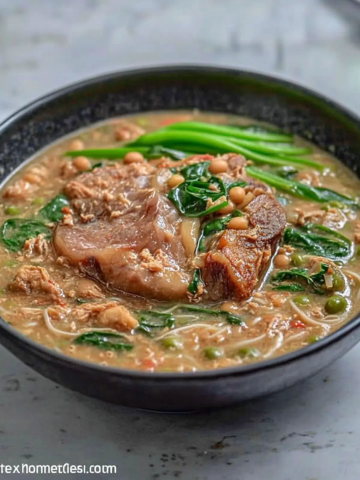 Pork Hock and Mung Beans with Vermicelli: Comfort in Every Bite 3 Pork Hock and Mung Beans with Vermicelli (Ginisang Monggo with Pata at Sotanghon)